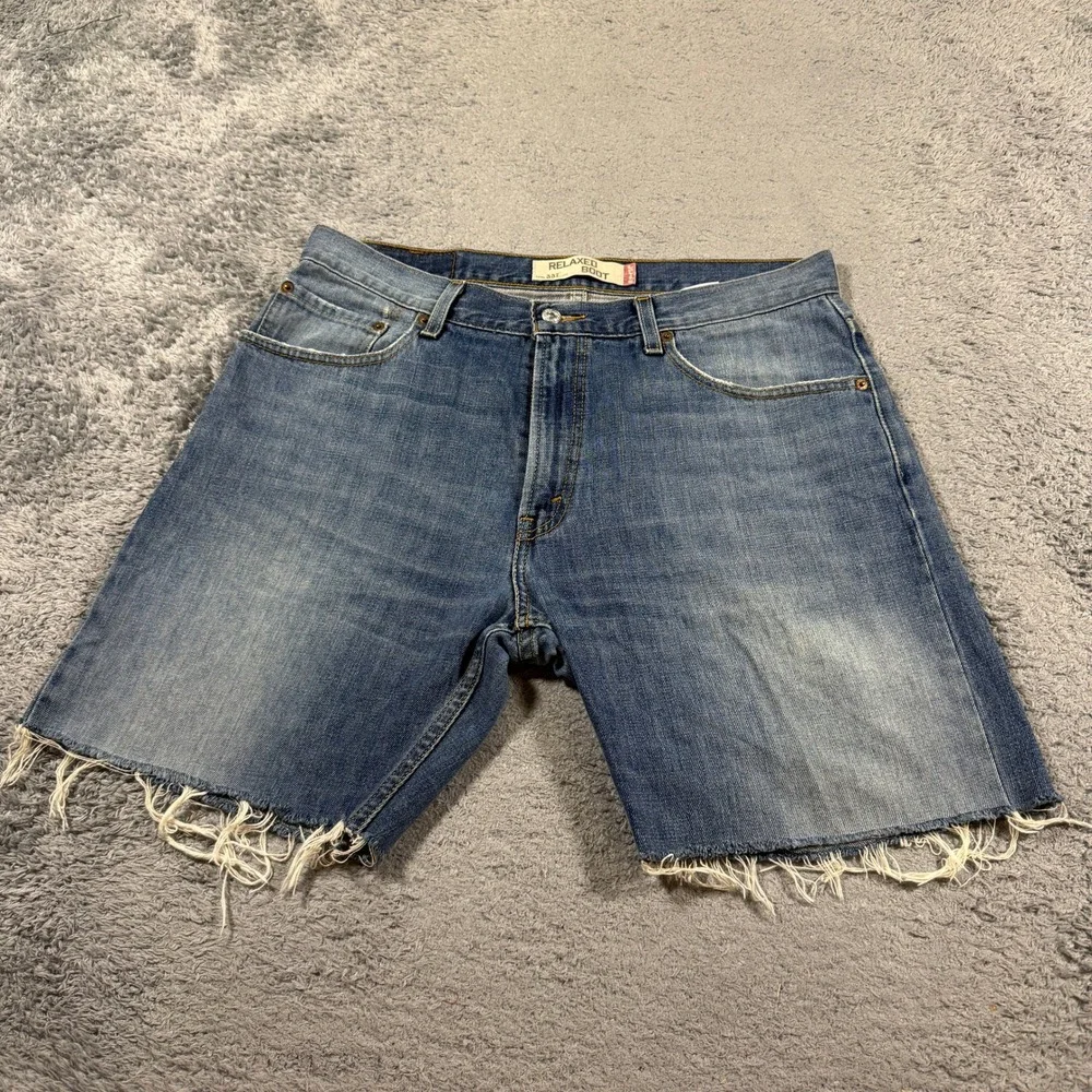 Levis Mens 557 Relaxed Boot Cut Off Denim Shorts W34 Blue Raw Hem Cotton